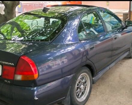 Синий Мицубиси Харизма, объемом двигателя 1.6 л и пробегом 375 тыс. км за 2250 $, фото 1 на Automoto.ua