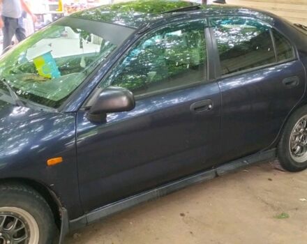 Синий Мицубиси Харизма, объемом двигателя 1.6 л и пробегом 375 тыс. км за 2250 $, фото 2 на Automoto.ua