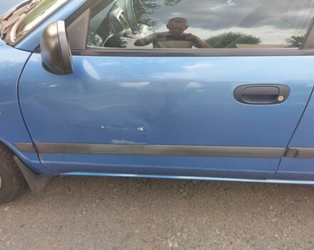 Синий Мицубиси Харизма, объемом двигателя 1.6 л и пробегом 320 тыс. км за 2000 $, фото 6 на Automoto.ua