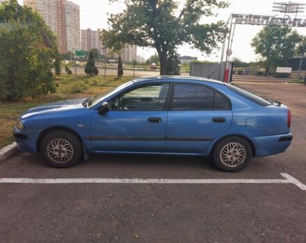 Синий Мицубиси Харизма, объемом двигателя 1.6 л и пробегом 320 тыс. км за 2000 $, фото 2 на Automoto.ua