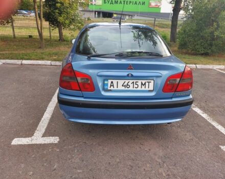 Синий Мицубиси Харизма, объемом двигателя 1.6 л и пробегом 320 тыс. км за 2000 $, фото 5 на Automoto.ua