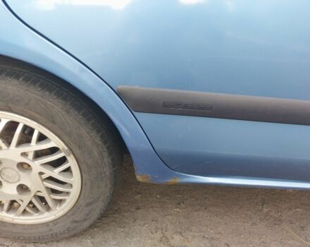 Синий Мицубиси Харизма, объемом двигателя 1.6 л и пробегом 320 тыс. км за 2000 $, фото 7 на Automoto.ua