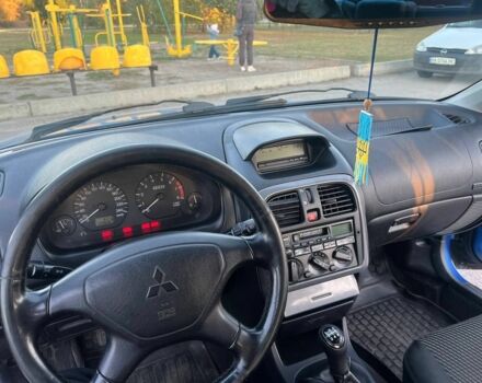 Синий Мицубиси Харизма, объемом двигателя 1.8 л и пробегом 240 тыс. км за 4000 $, фото 10 на Automoto.ua