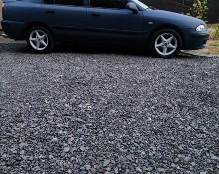 Синий Мицубиси Харизма, объемом двигателя 1.9 л и пробегом 300 тыс. км за 2576 $, фото 11 на Automoto.ua