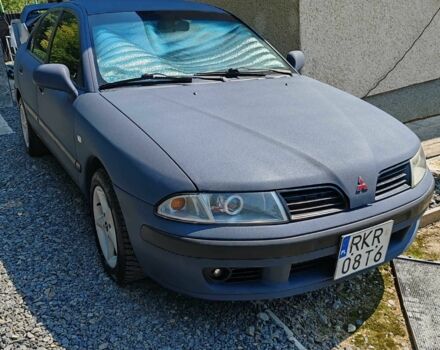 Синий Мицубиси Харизма, объемом двигателя 1.9 л и пробегом 300 тыс. км за 2576 $, фото 1 на Automoto.ua