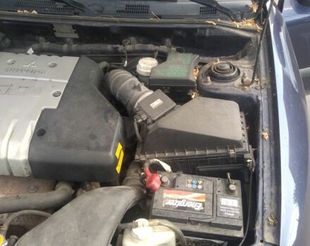 Синій Міцубісі Харизма, об'ємом двигуна 0 л та пробігом 263 тис. км за 1300 $, фото 8 на Automoto.ua