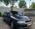Синий Мицубиси Харизма, объемом двигателя 1.8 л и пробегом 180 тыс. км за 3501 $, фото 1 на Automoto.ua