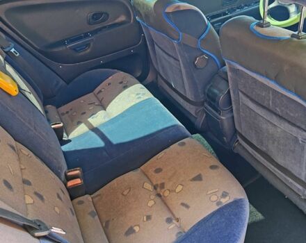 Синий Мицубиси Харизма, объемом двигателя 1.9 л и пробегом 300 тыс. км за 2576 $, фото 10 на Automoto.ua