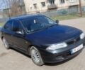 Синий Мицубиси Харизма, объемом двигателя 0 л и пробегом 300 тыс. км за 1700 $, фото 1 на Automoto.ua