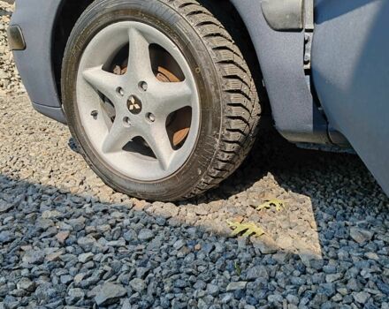 Синий Мицубиси Харизма, объемом двигателя 1.9 л и пробегом 300 тыс. км за 2576 $, фото 8 на Automoto.ua