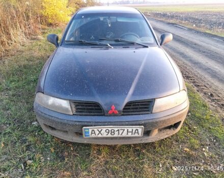 Синий Мицубиси Харизма, объемом двигателя 1.6 л и пробегом 300 тыс. км за 1800 $, фото 3 на Automoto.ua