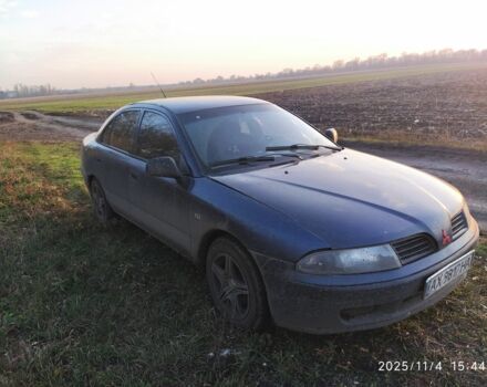 Синий Мицубиси Харизма, объемом двигателя 1.6 л и пробегом 300 тыс. км за 1800 $, фото 4 на Automoto.ua