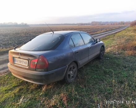Синий Мицубиси Харизма, объемом двигателя 1.6 л и пробегом 300 тыс. км за 1800 $, фото 5 на Automoto.ua