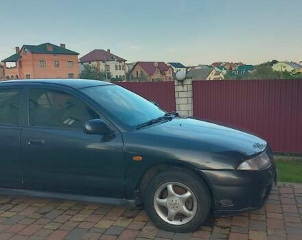 Синий Мицубиси Харизма, объемом двигателя 1.8 л и пробегом 276 тыс. км за 2400 $, фото 8 на Automoto.ua