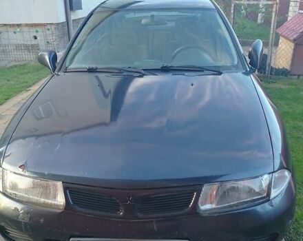 Синий Мицубиси Харизма, объемом двигателя 1.8 л и пробегом 276 тыс. км за 2400 $, фото 9 на Automoto.ua