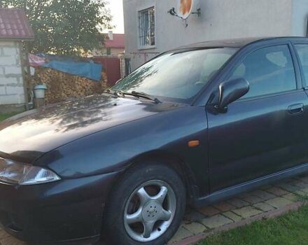 Синий Мицубиси Харизма, объемом двигателя 1.8 л и пробегом 276 тыс. км за 2400 $, фото 10 на Automoto.ua