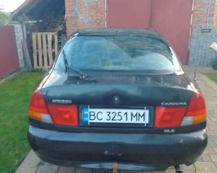 Синий Мицубиси Харизма, объемом двигателя 1.8 л и пробегом 276 тыс. км за 2400 $, фото 6 на Automoto.ua