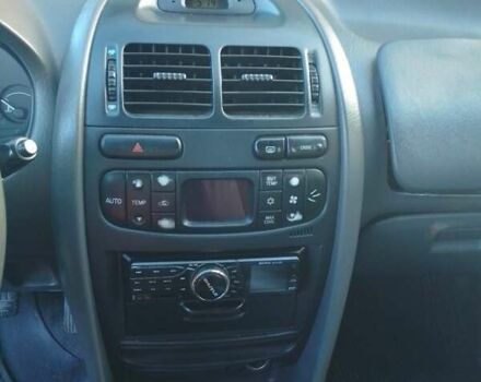 Синий Мицубиси Харизма, объемом двигателя 1.8 л и пробегом 276 тыс. км за 2400 $, фото 3 на Automoto.ua