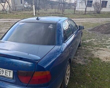 Синий Мицубиси Харизма, объемом двигателя 1.6 л и пробегом 380 тыс. км за 1900 $, фото 2 на Automoto.ua