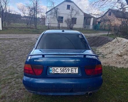 Синий Мицубиси Харизма, объемом двигателя 1.6 л и пробегом 380 тыс. км за 1900 $, фото 3 на Automoto.ua