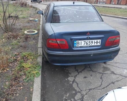 Синий Мицубиси Харизма, объемом двигателя 1.6 л и пробегом 450 тыс. км за 1800 $, фото 6 на Automoto.ua