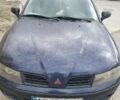 Синий Мицубиси Харизма, объемом двигателя 1.6 л и пробегом 391 тыс. км за 2300 $, фото 1 на Automoto.ua