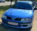 Синій Міцубісі Харизма, об'ємом двигуна 1.6 л та пробігом 220 тис. км за 1850 $, фото 1 на Automoto.ua