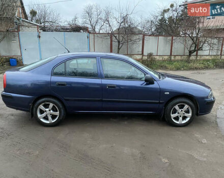 Синій Міцубісі Харизма, об'ємом двигуна 1.6 л та пробігом 170 тис. км за 3000 $, фото 9 на Automoto.ua