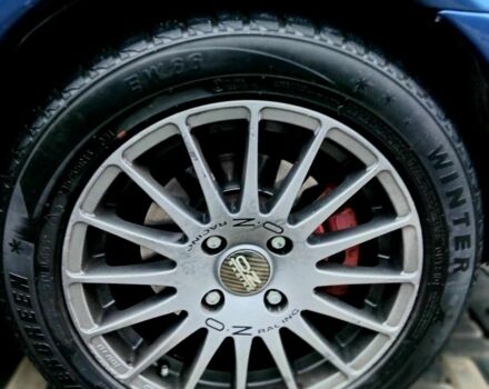 Синий Мицубиси Харизма, объемом двигателя 1.8 л и пробегом 305 тыс. км за 3999 $, фото 6 на Automoto.ua