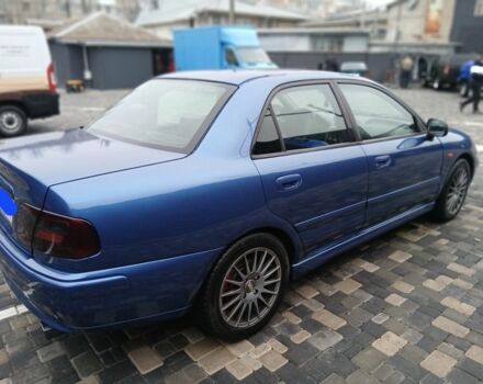 Синий Мицубиси Харизма, объемом двигателя 1.8 л и пробегом 305 тыс. км за 3999 $, фото 2 на Automoto.ua