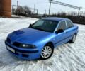 Синий Мицубиси Харизма, объемом двигателя 1.6 л и пробегом 300 тыс. км за 2700 $, фото 1 на Automoto.ua