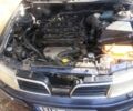 Синій Міцубісі Харизма, об'ємом двигуна 0 л та пробігом 235 тис. км за 1100 $, фото 1 на Automoto.ua