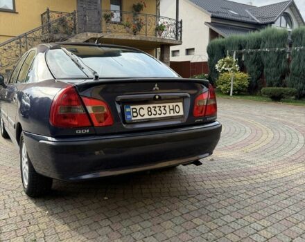 Синий Мицубиси Харизма, объемом двигателя 1.8 л и пробегом 275 тыс. км за 3000 $, фото 4 на Automoto.ua
