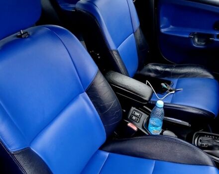 Синий Мицубиси Харизма, объемом двигателя 1.8 л и пробегом 305 тыс. км за 3999 $, фото 7 на Automoto.ua