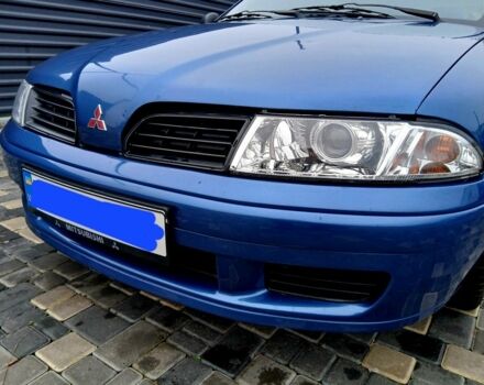 Синий Мицубиси Харизма, объемом двигателя 1.8 л и пробегом 305 тыс. км за 3999 $, фото 11 на Automoto.ua