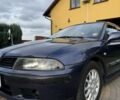 Синий Мицубиси Харизма, объемом двигателя 1.8 л и пробегом 275 тыс. км за 3000 $, фото 1 на Automoto.ua