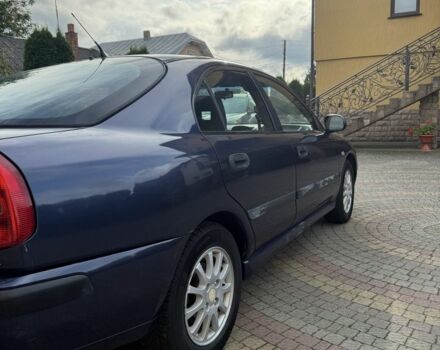 Синий Мицубиси Харизма, объемом двигателя 1.8 л и пробегом 275 тыс. км за 3000 $, фото 7 на Automoto.ua