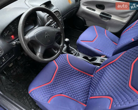 Синій Міцубісі Харизма, об'ємом двигуна 1.6 л та пробігом 170 тис. км за 3000 $, фото 12 на Automoto.ua