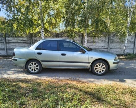 Синій Міцубісі Харизма, об'ємом двигуна 1.8 л та пробігом 250 тис. км за 3000 $, фото 2 на Automoto.ua