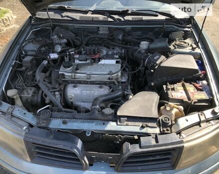 Синий Мицубиси Харизма, объемом двигателя 1.6 л и пробегом 190 тыс. км за 2600 $, фото 15 на Automoto.ua