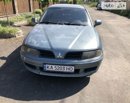Синий Мицубиси Харизма, объемом двигателя 1.6 л и пробегом 190 тыс. км за 2600 $, фото 1 на Automoto.ua
