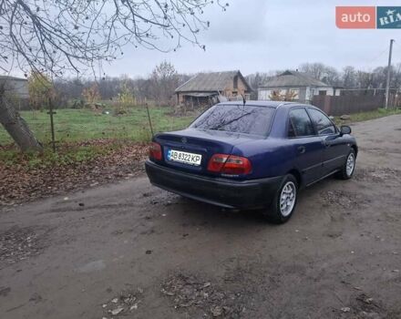 Синій Міцубісі Харизма, об'ємом двигуна 1.83 л та пробігом 205 тис. км за 2100 $, фото 2 на Automoto.ua