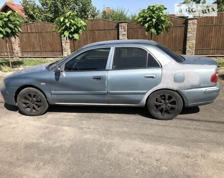 Синий Мицубиси Харизма, объемом двигателя 1.6 л и пробегом 190 тыс. км за 2600 $, фото 4 на Automoto.ua