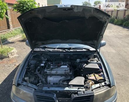 Синий Мицубиси Харизма, объемом двигателя 1.6 л и пробегом 190 тыс. км за 2600 $, фото 16 на Automoto.ua