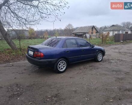 Синій Міцубісі Харизма, об'ємом двигуна 1.83 л та пробігом 190 тис. км за 2200 $, фото 1 на Automoto.ua