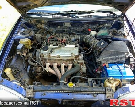 Синій Міцубісі Харизма, об'ємом двигуна 1.6 л та пробігом 300 тис. км за 1900 $, фото 6 на Automoto.ua