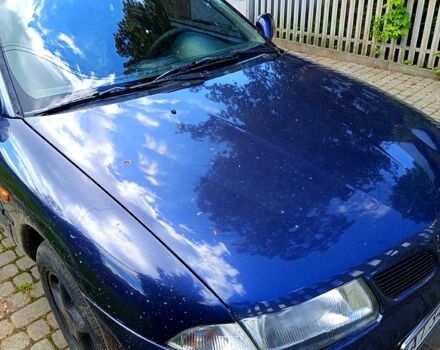 Синій Міцубісі Харизма, об'ємом двигуна 1.6 л та пробігом 300 тис. км за 1900 $, фото 3 на Automoto.ua