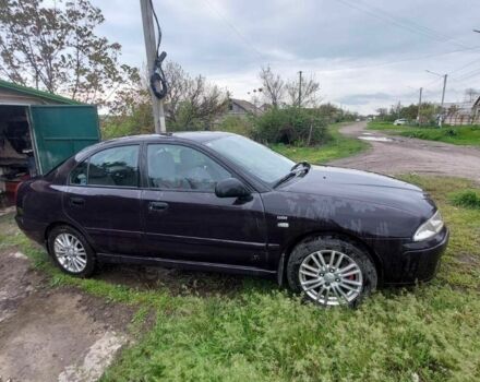 Синій Міцубісі Харизма, об'ємом двигуна 0.18 л та пробігом 237 тис. км за 4000 $, фото 4 на Automoto.ua