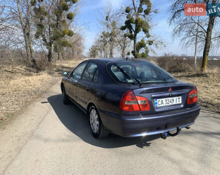 Синий Мицубиси Харизма, объемом двигателя 1.87 л и пробегом 380 тыс. км за 3900 $, фото 8 на Automoto.ua