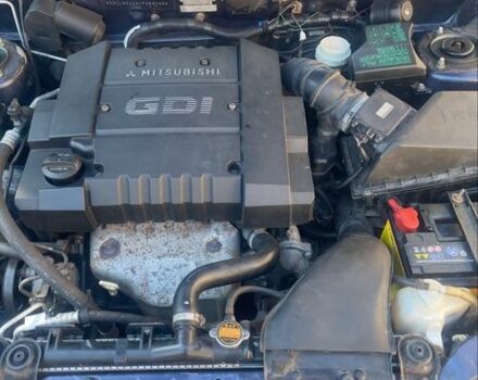 Синий Мицубиси Харизма, объемом двигателя 1.8 л и пробегом 250 тыс. км за 3000 $, фото 10 на Automoto.ua